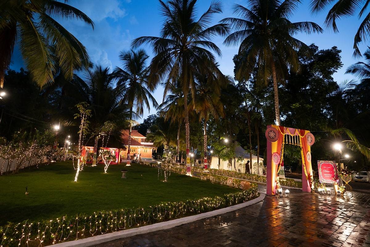 Wedding lawn dining setup at Kalapura