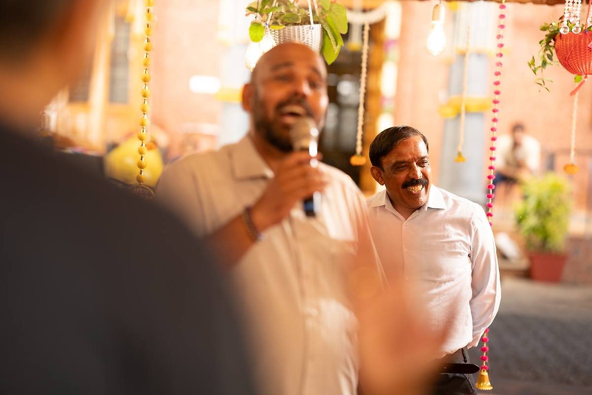 Family speech under decorated veranda