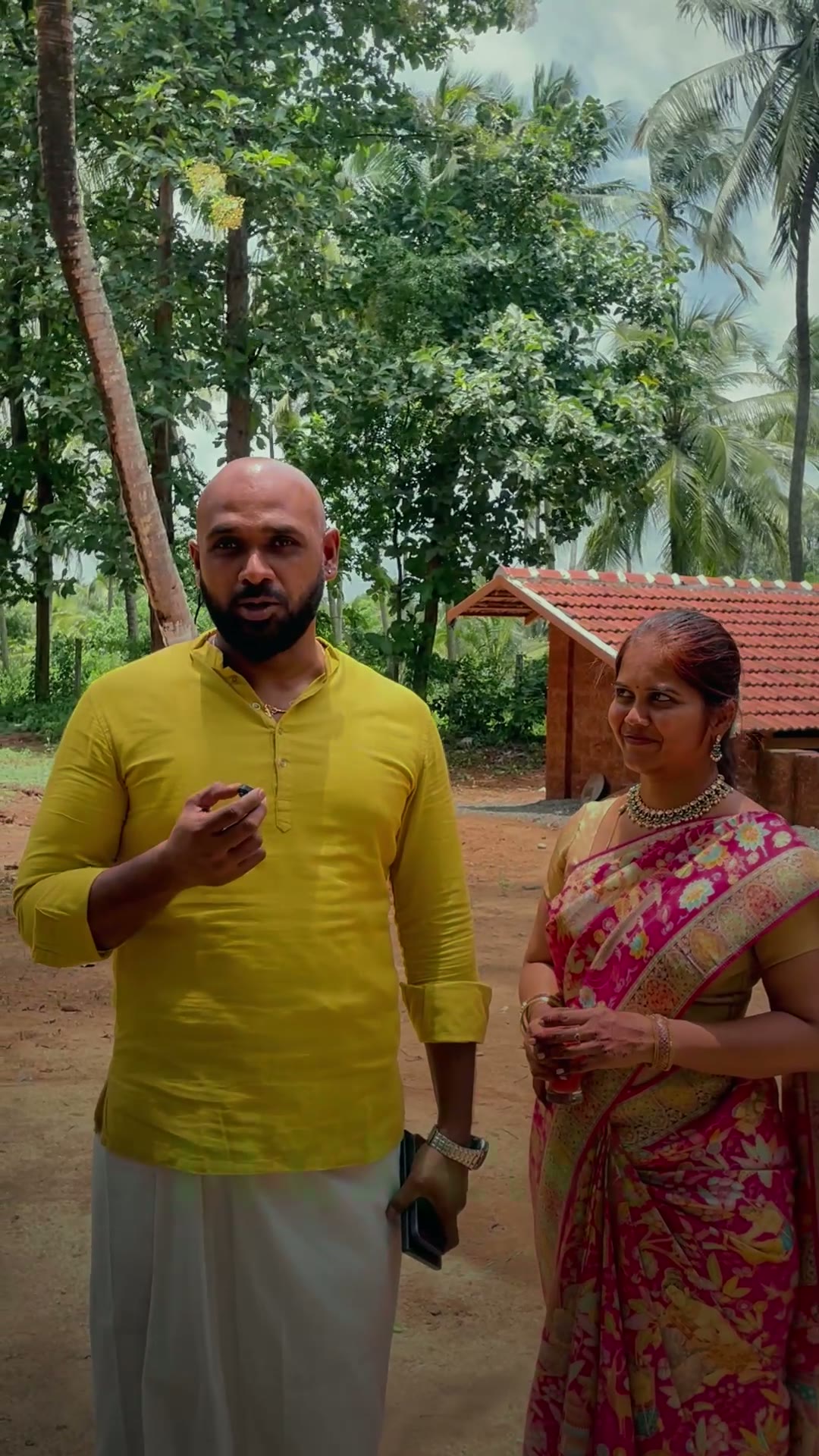 Guests speaking on camera in the grounds of Tarini’s Kalapura